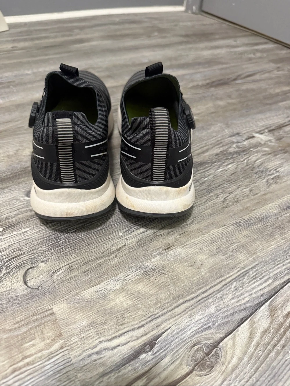 Skechers Black and White Slip-On Knit Sneakers